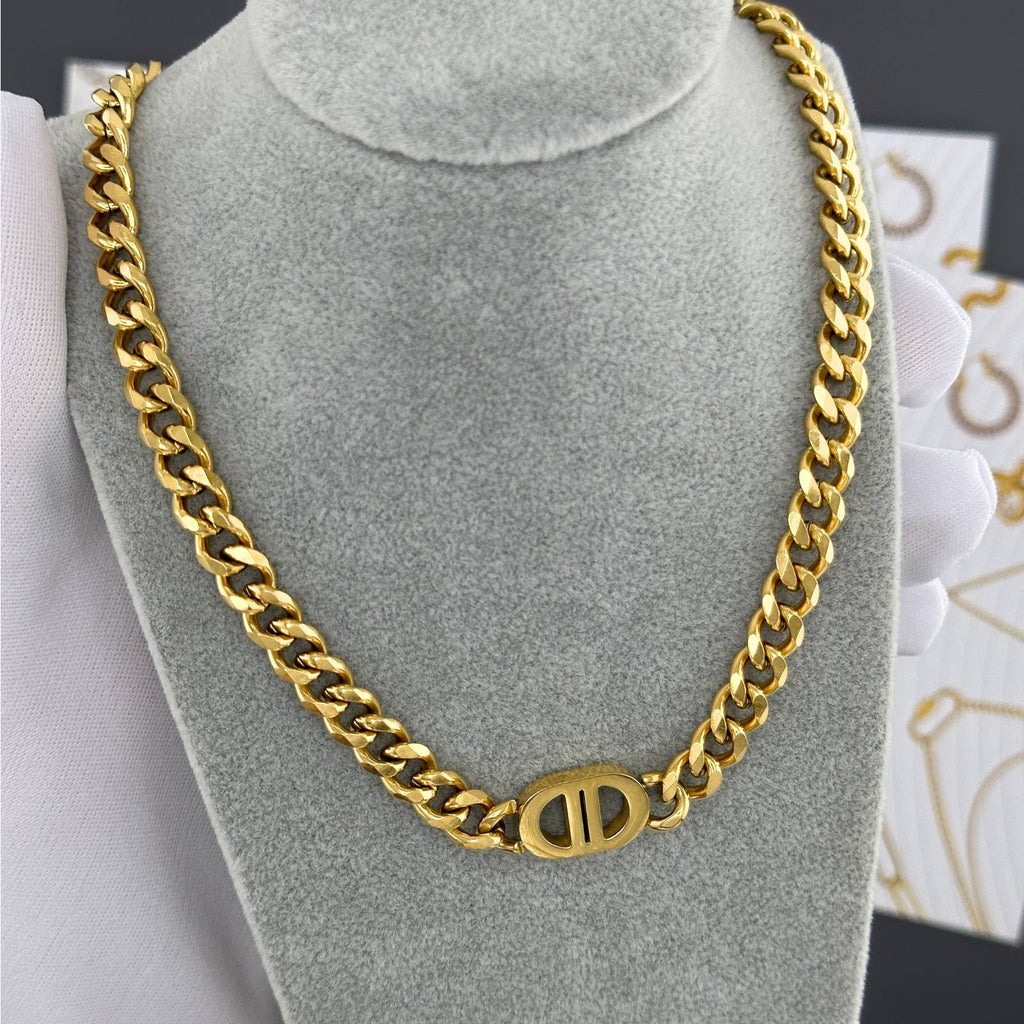 Gold-plated stainless steel signature link necklace with a modern chain design and polished centerpiece accent.