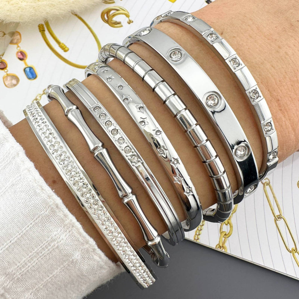 Multiple Stainless steel bangle bracelets.