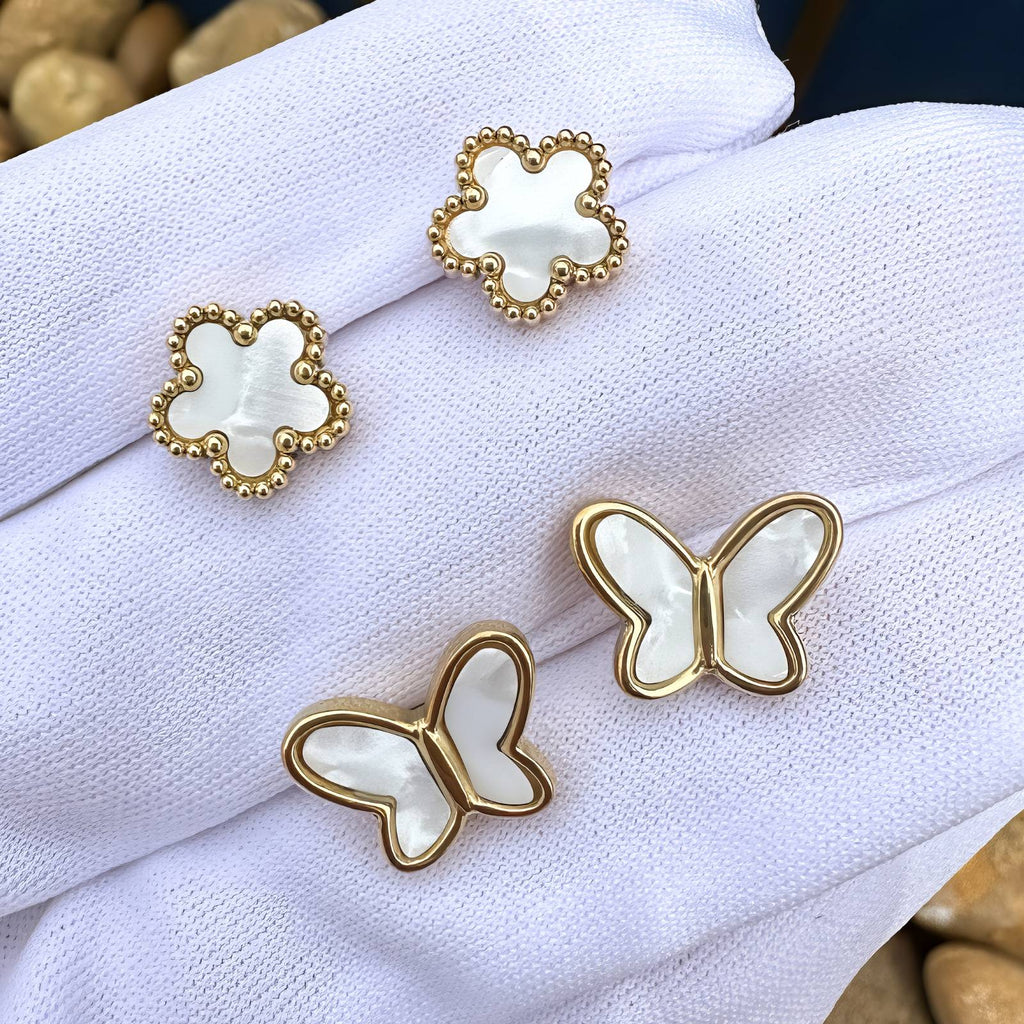 18K gold plated stainless steel butterfly stud earrings featuring a minimalist open butterfly design.