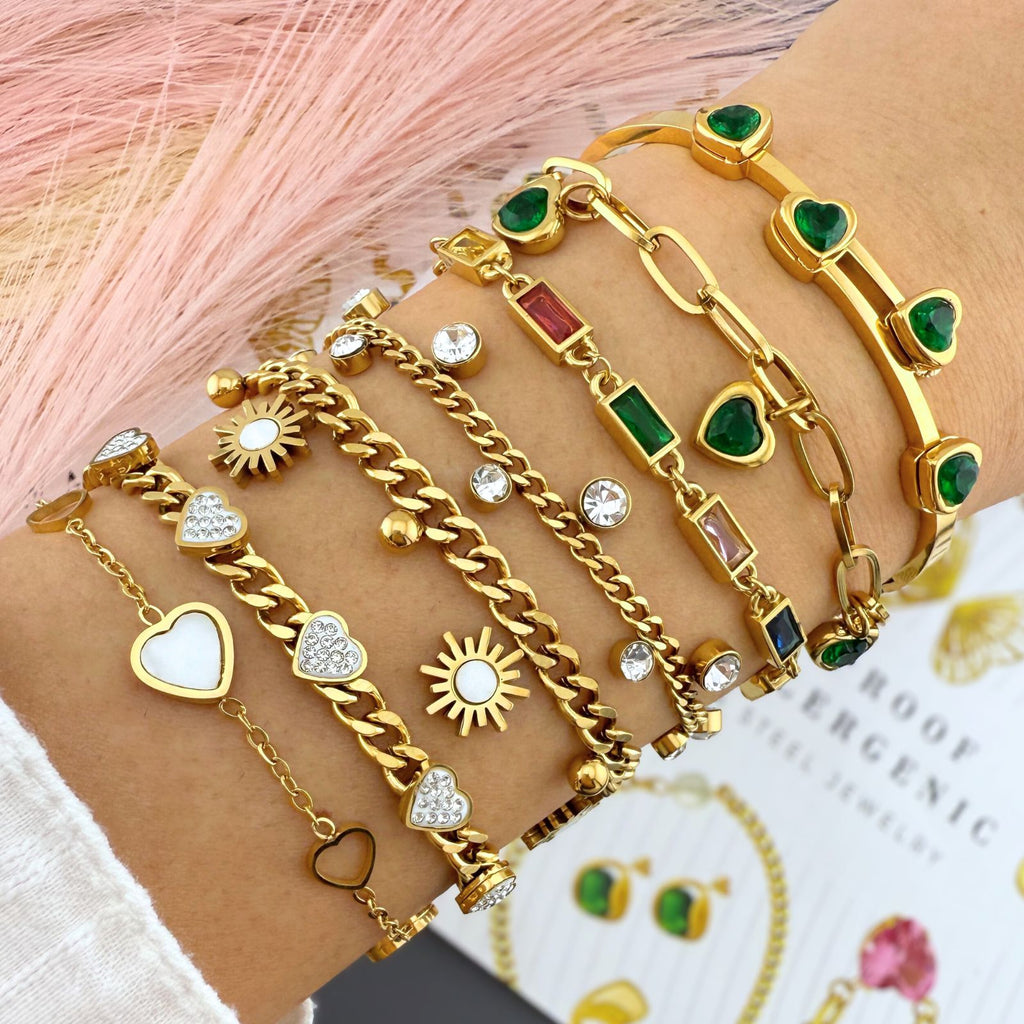 Multiple 18K gold plated stainless steel bracelet featuring sparkling cubic zirconia heart charms and a bold chain design.