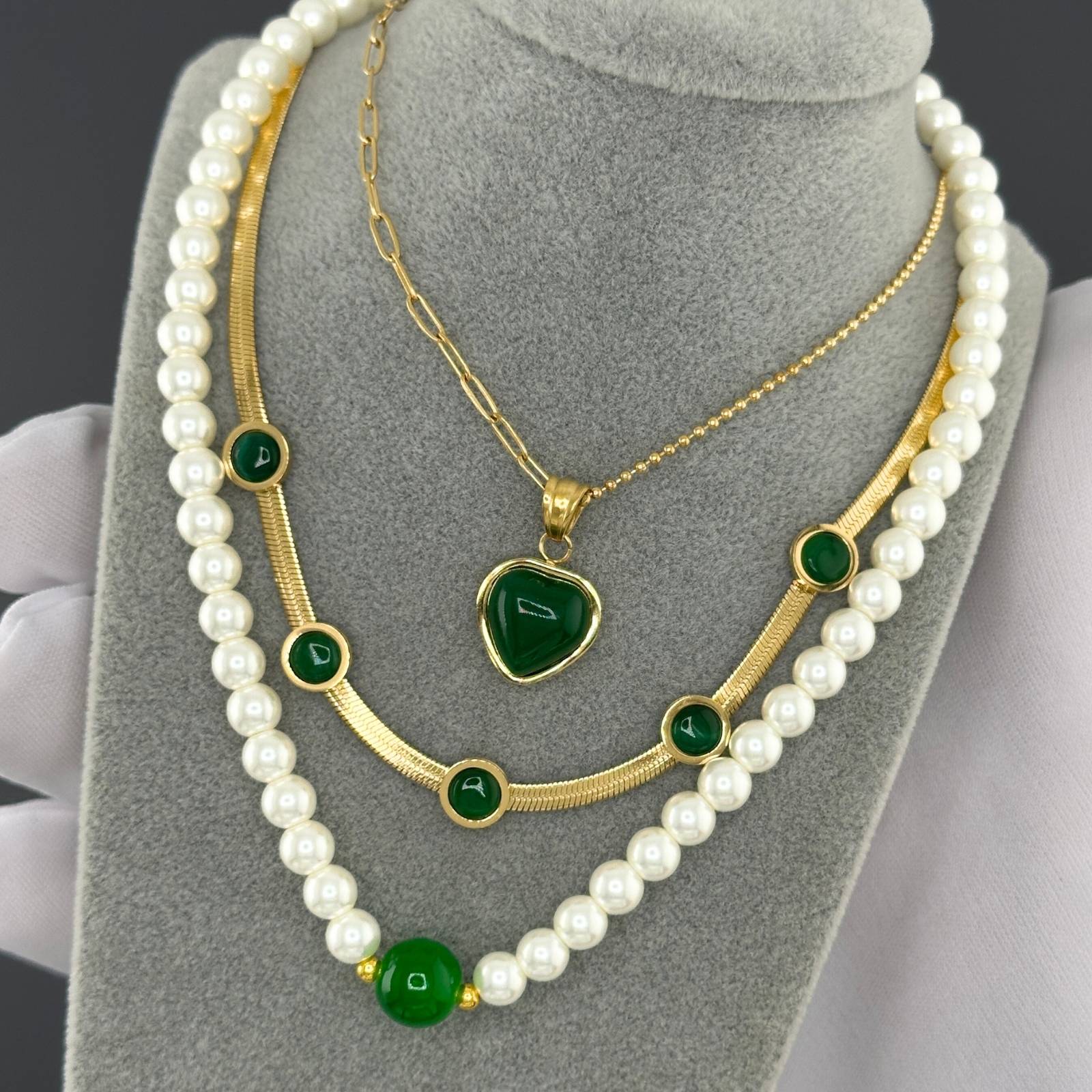 Layered Pearl necklace with emerald green centerpiece crafted from 18K gold-plated stainless steel.