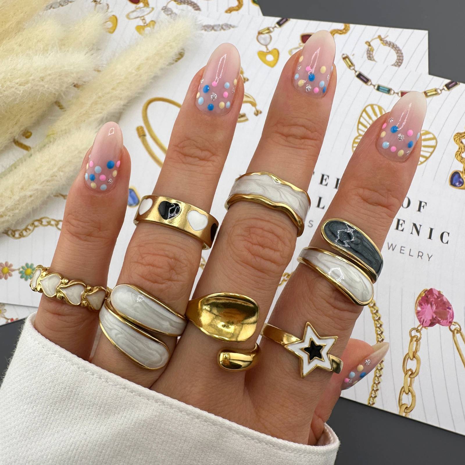 18K gold plated stainless steel adjustable rings featuring white and black enamel designs.