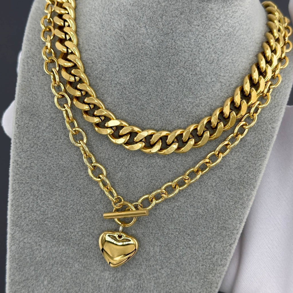 Layered 18K gold-plated stainless steel heart necklace with chunky chain and toggle clasp closure.