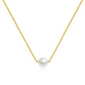 Minimalist pearl pendant necklace in 18K gold-plated stainless steel.