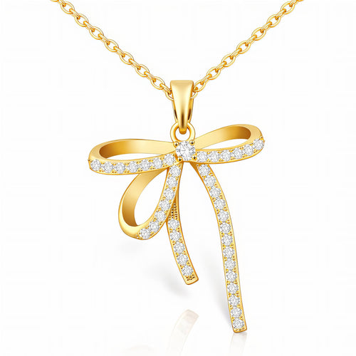 Crystal bow pendant necklace in 18K gold-plated stainless steel with sparkling cubic zirconia stones.