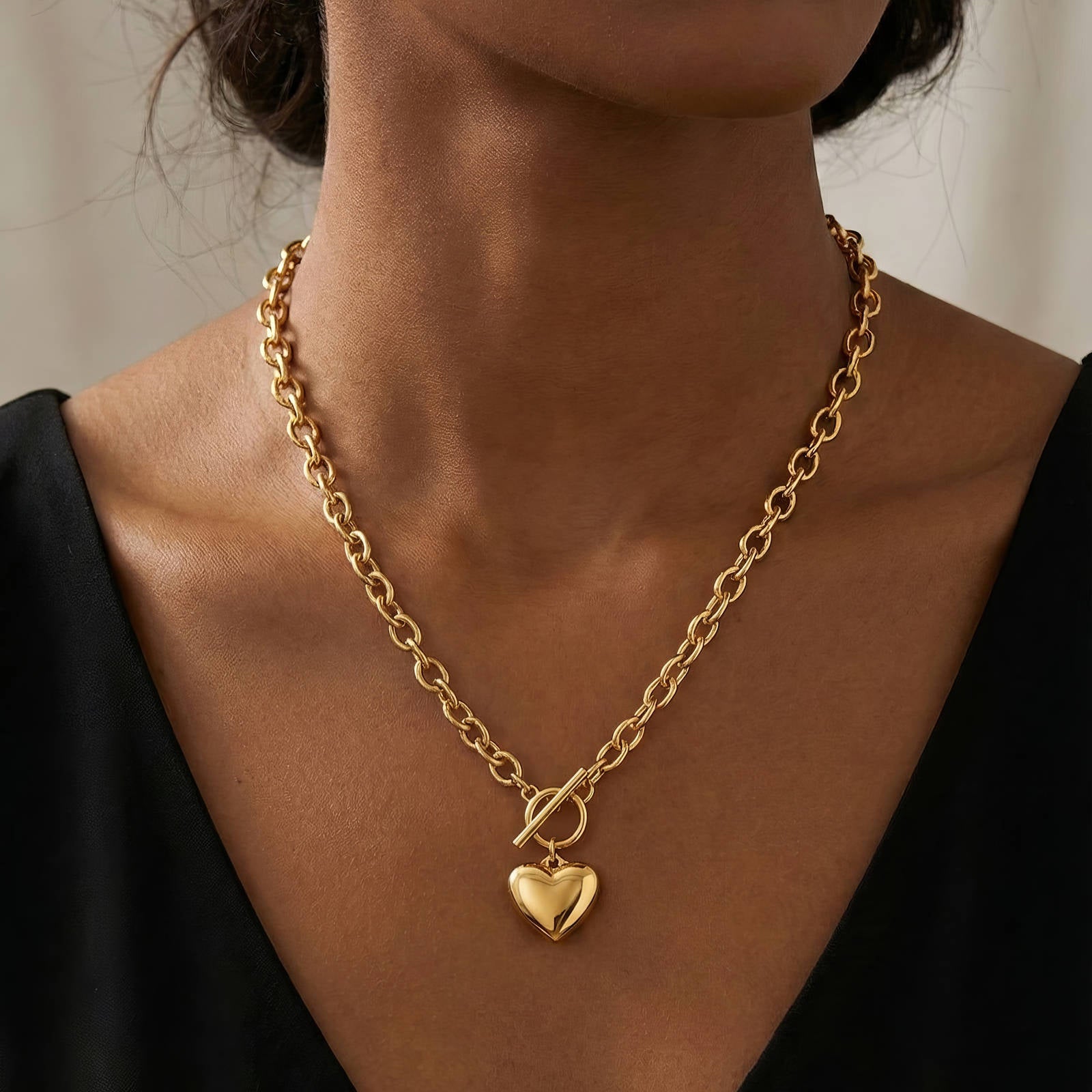 18K gold-plated stainless steel heart necklace with chunky chain and toggle clasp closure.