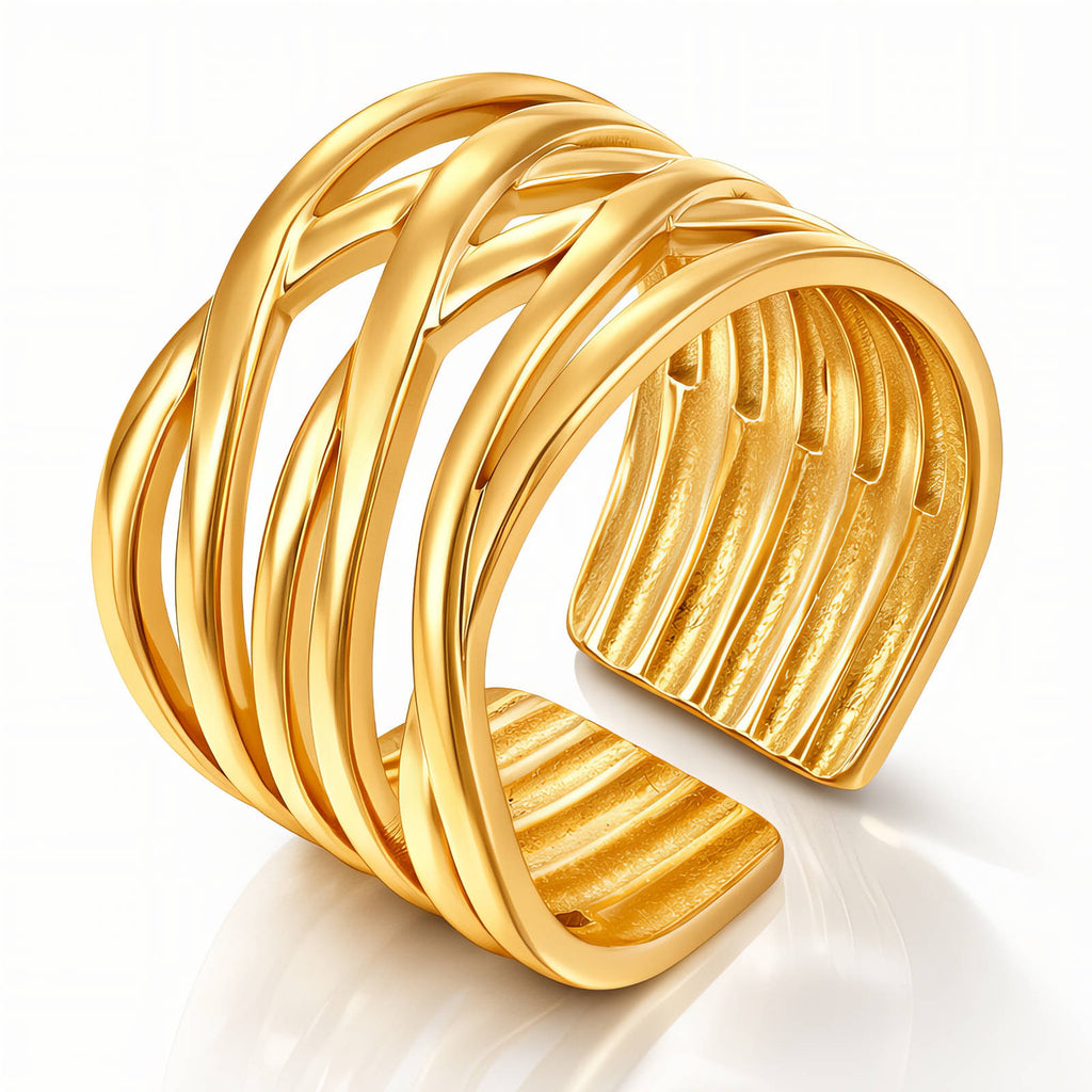18K gold plated stainless steel adjustable statement ring featuring an openwork wave-inspired design.