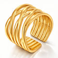 18K gold plated stainless steel adjustable statement ring featuring an openwork wave-inspired design.