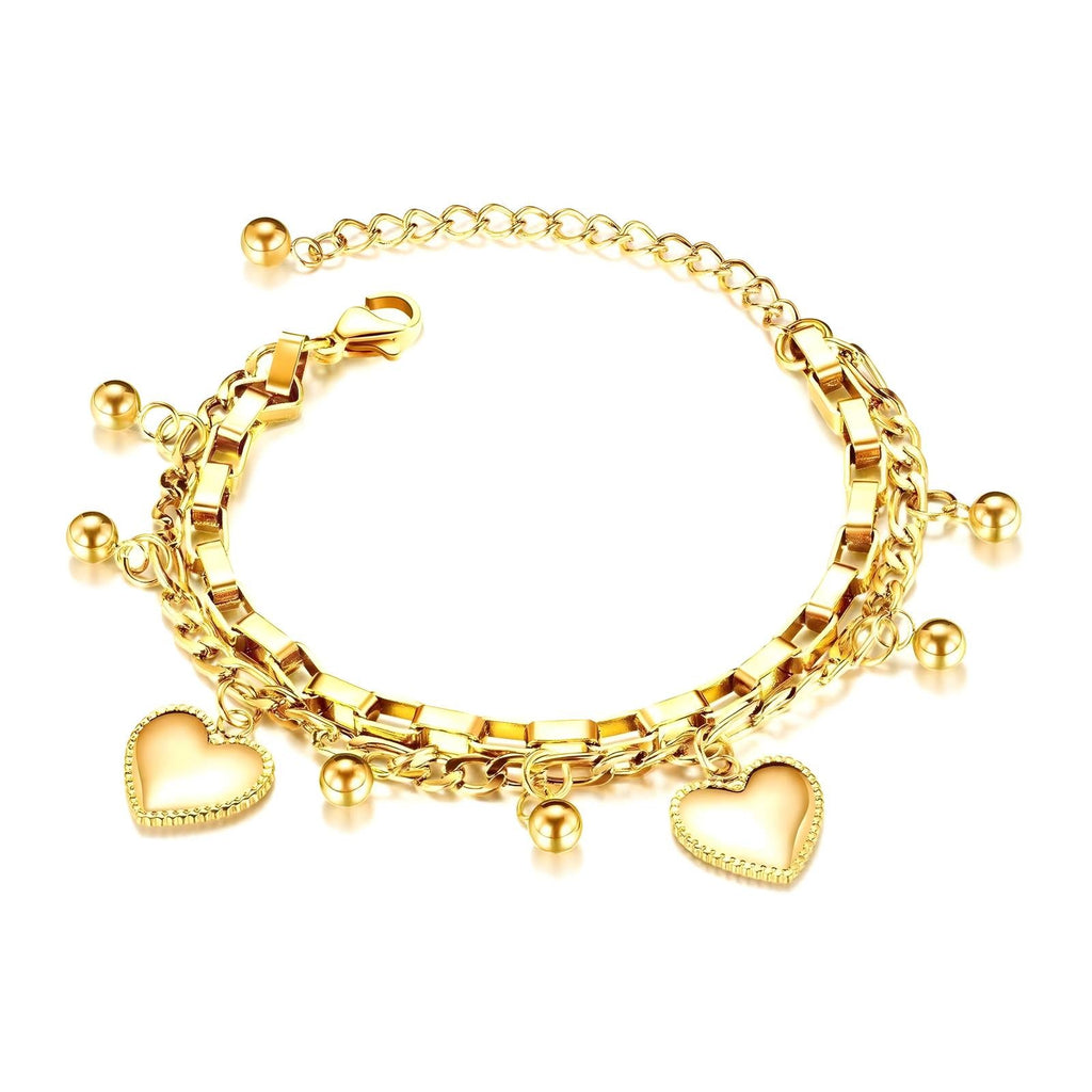 18K gold plated stainless steel bracelet featuring layered chains and dangling heart charms.