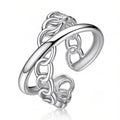 Polished stainless steel adjustable ring featuring a modern chain-link inspired design with an open-band silhouette.