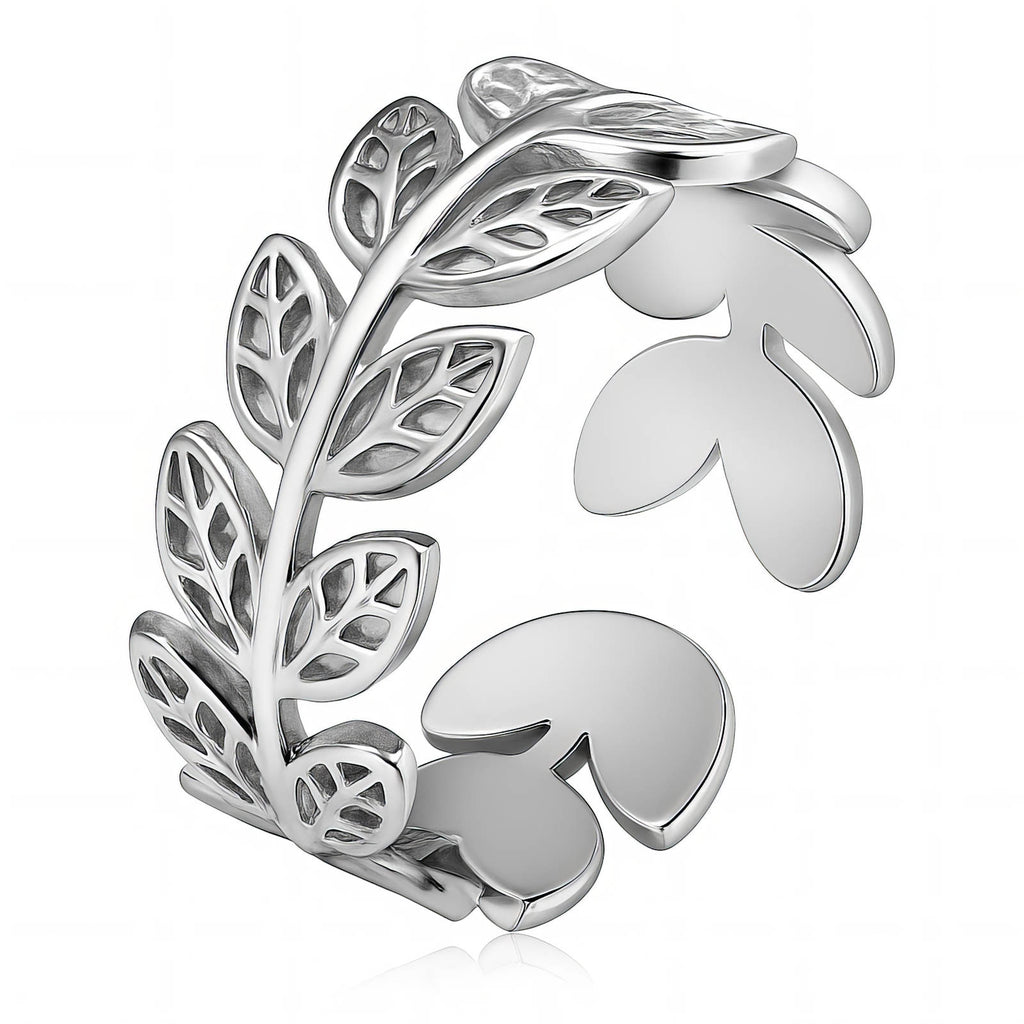 Stainless steel adjustable ring featuring an intricate botanical leaf design with detailed openwork accents.