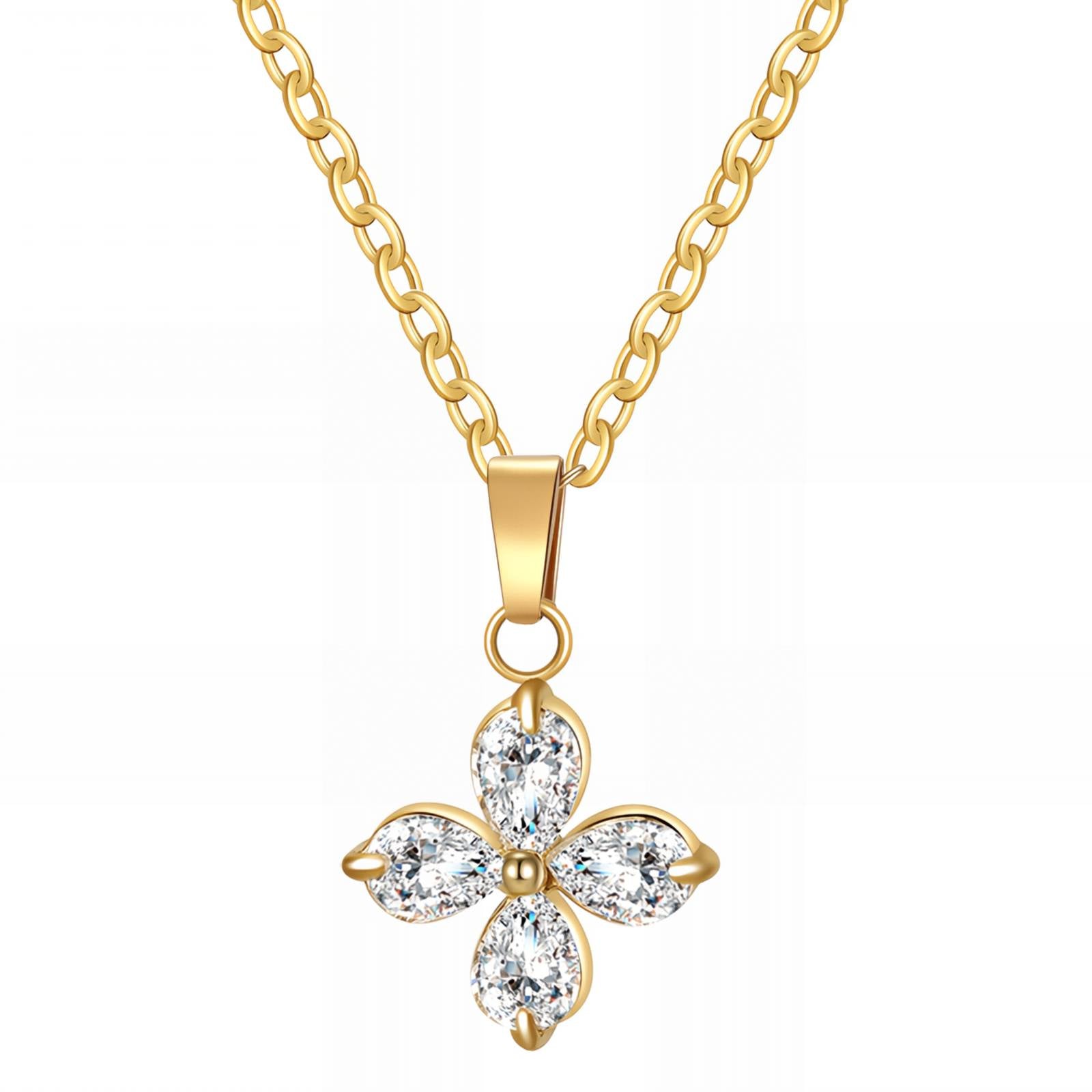 Crystal flower pendant necklace in 18K gold-plated stainless steel with sparkling cubic zirconia stones.