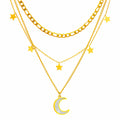 Layered gold necklace featuring a crescent moon pendant and star charms crafted from waterproof hypoallergenic stainless steel.