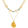 Gold layered necklace featuring a spiral seashell pendant, shell beads, and turquoise accents crafted from waterproof hypoallergenic stainless steel.