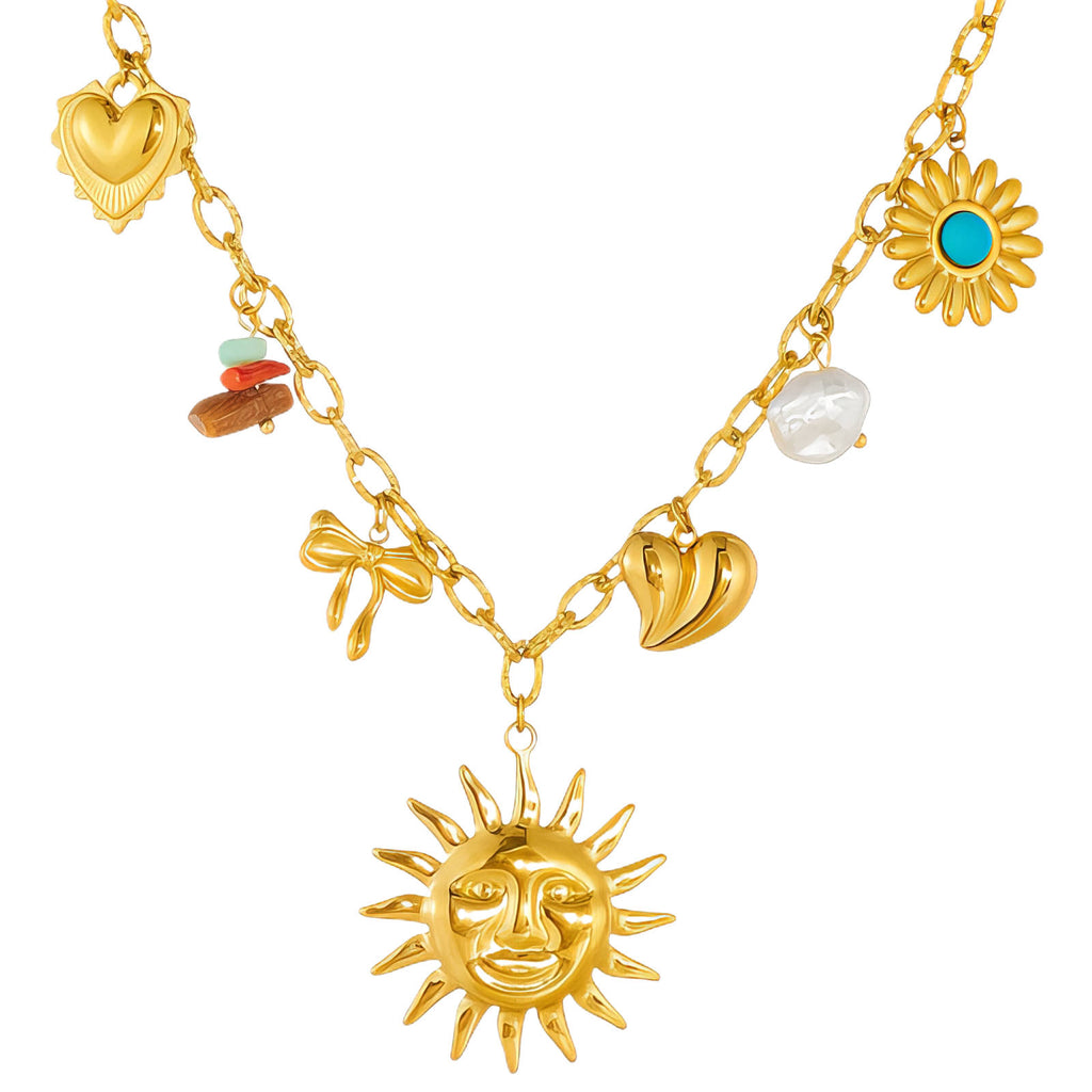 Gold charm necklace featuring a sun face pendant, turquoise stone accents, pearl details, and celestial-inspired charms crafted from waterproof stainless steel.