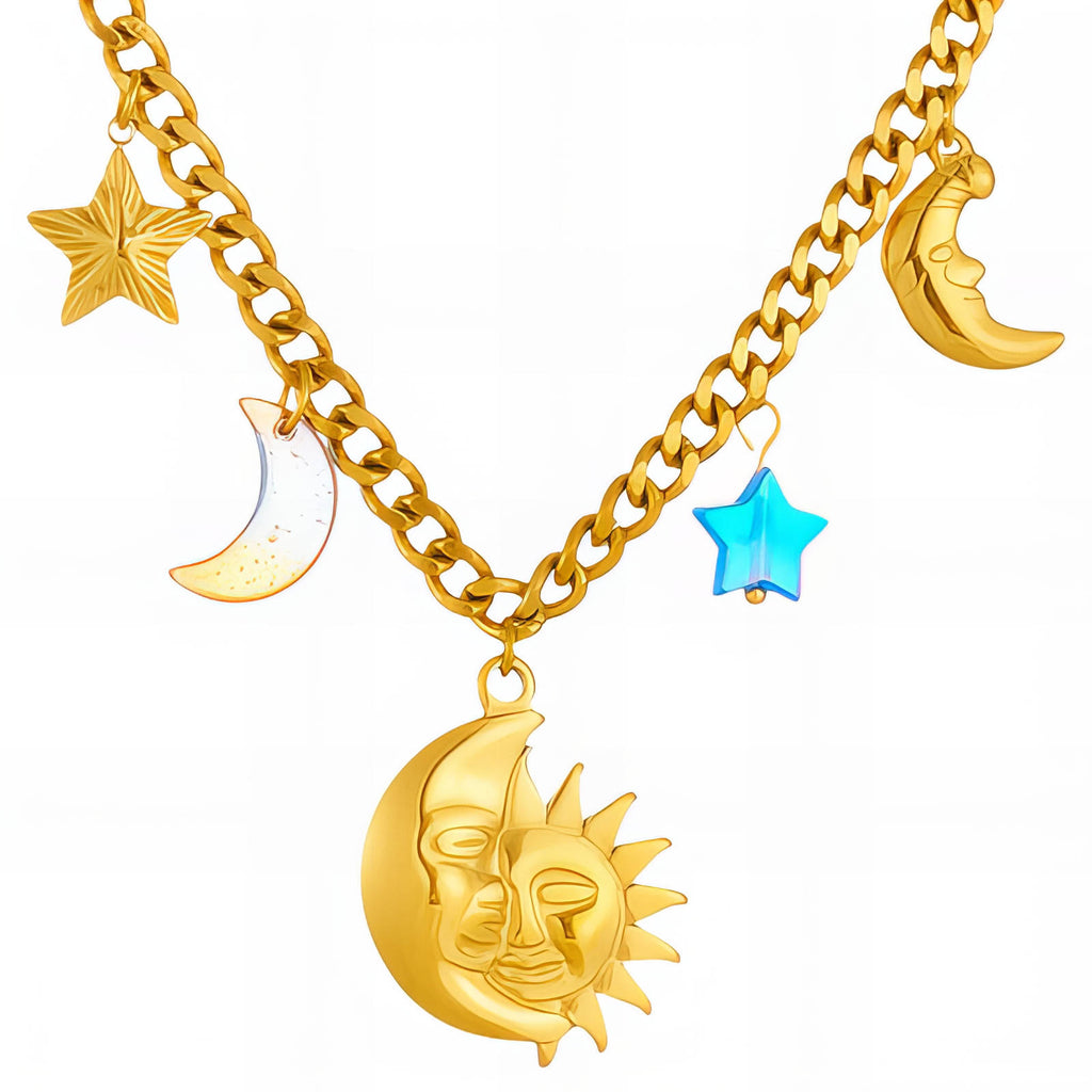 Gold celestial charm necklace featuring sun, moon, and star pendants crafted from waterproof hypoallergenic 18K gold-plated stainless steel.