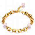 18K gold plated stainless steel bracelet featuring chunky gold links and pearl-inspired accents with an adjustable chain.