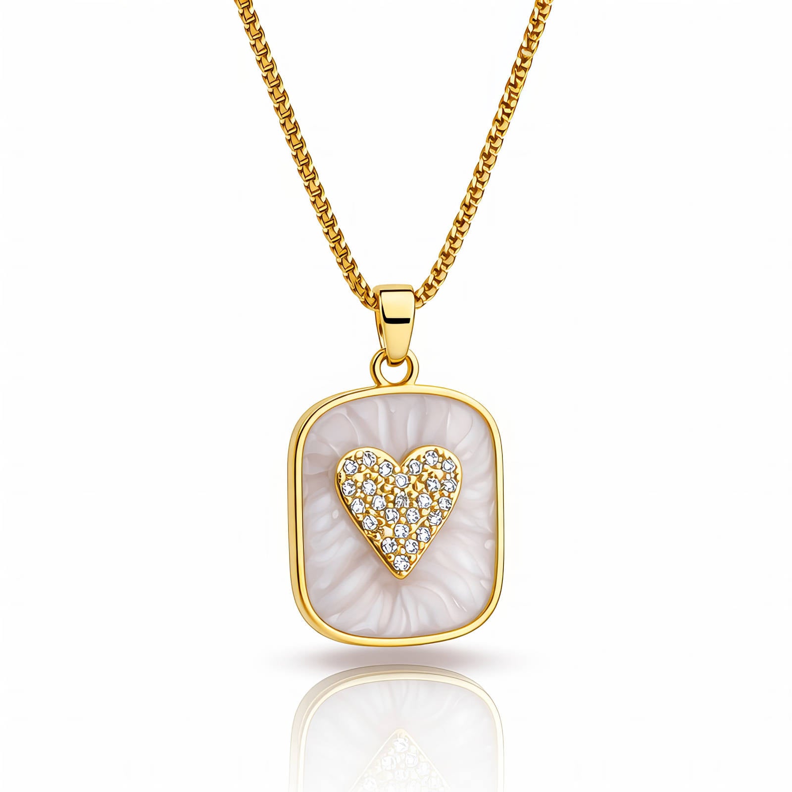 Gold heart pendant necklace featuring sparkling cubic zirconia and a mother-of-pearl inspired background crafted from waterproof hypoallergenic stainless steel.