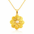 Gold sunburst flower pendant necklace featuring a pearl-inspired center crafted from waterproof hypoallergenic 18K gold-plated stainless steel.