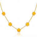 Golden flower necklace crafted from 18K gold-plated stainless steel featuring delicate floral charms on a waterproof hypoallergenic chain.